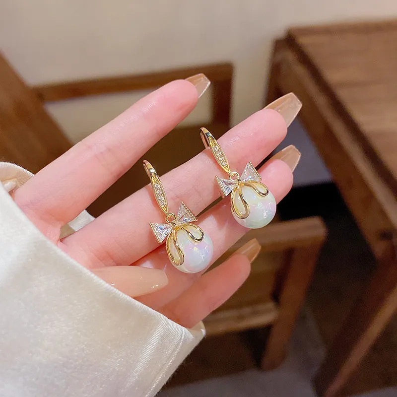 Bông tai nơ ngọc đính đá thiết kế giọt nước cao cấp với chi tiết tinh xảo