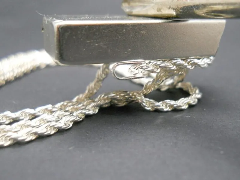 Kiểm tra bạc thật bằng nam châm